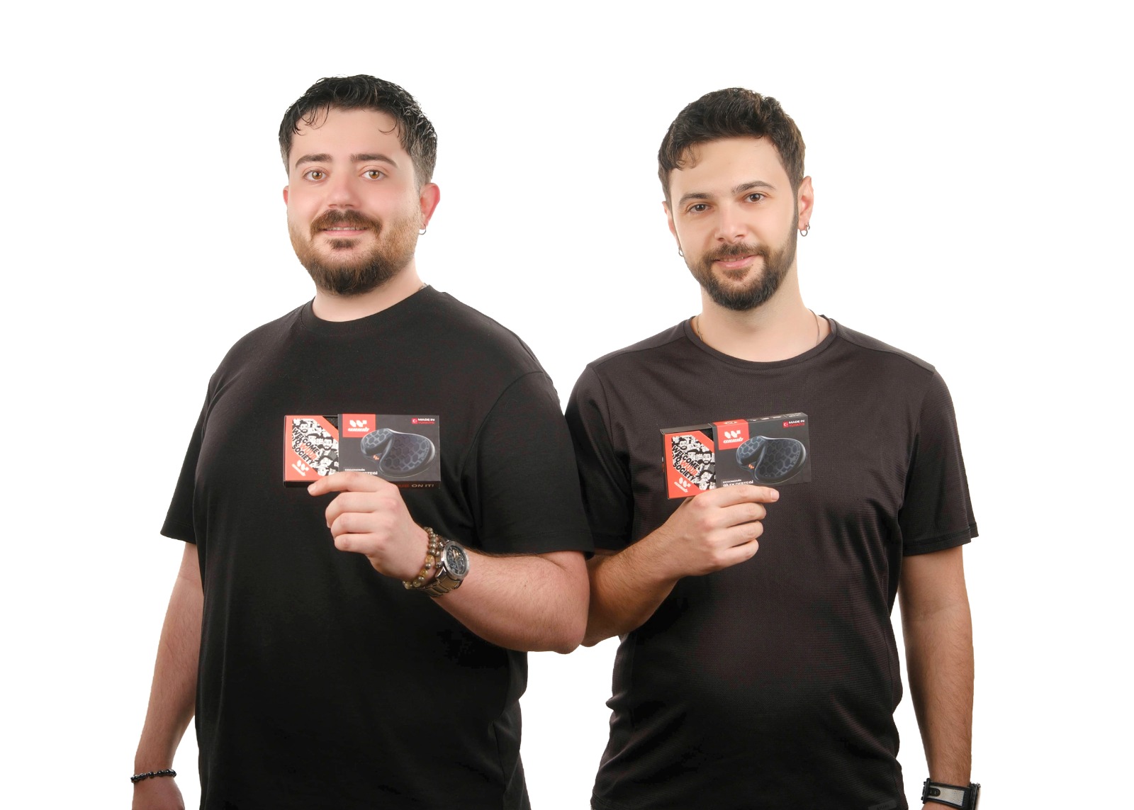 Kutay Kunt and Barkın Güler holding WUUB boxes